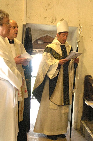Vicar, Rector and Bishop at the service