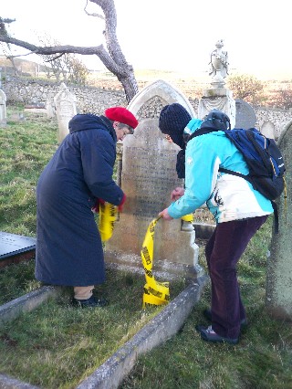 Marking a wobbly headstone